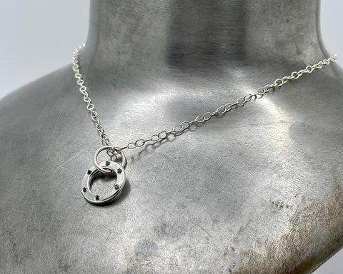 forged round amulet piccolo with black diamonds necklace sterling silver