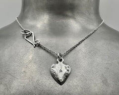ETERNAL HEART NECKLACE PLATINUM AND DIAMONDS