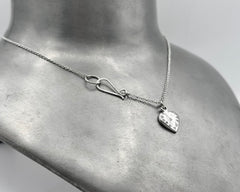 ETERNAL HEART NECKLACE PLATINUM AND DIAMONDS