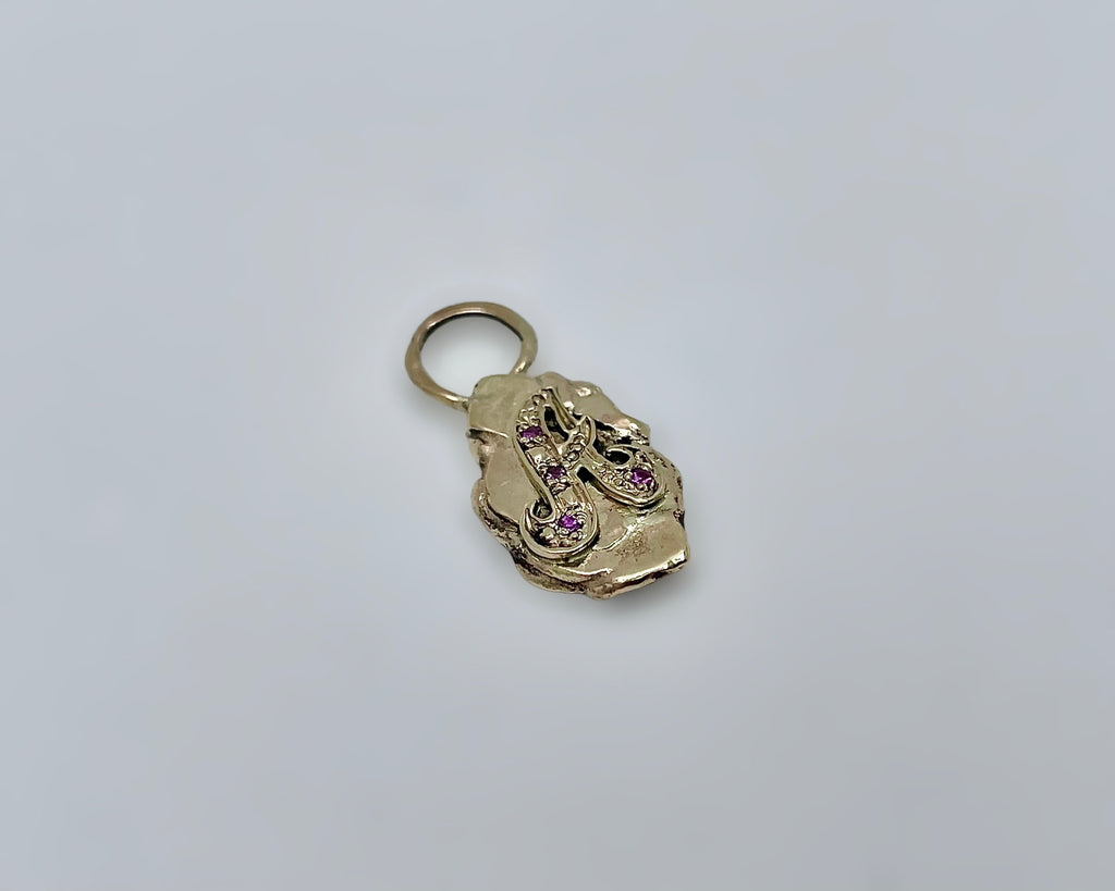 "A" charm yellow gold and pink sapphires