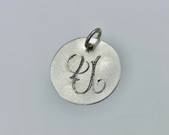 COIN WITH CARVED INITAL STERLING SILVER