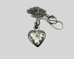 ETERNAL HEART NECKLACE PLATINUM AND DIAMONDS