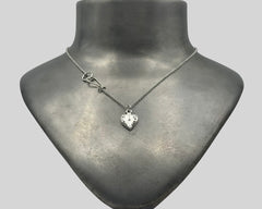 ETERNAL HEART NECKLACE PLATINUM AND DIAMONDS
