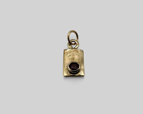 FORGED TAG WITH RUBY CHARM YELLOW GOLD