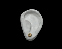 forged round studs with emeralds yellow gold