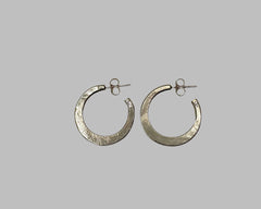 Forged crescent hoops yellow gold